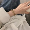 A girl with a thick chain bracelet from Europe and America, a niche Cuban chain, hip-hop, exaggerated personality, and retro bracelet from Instagram Application Scenario